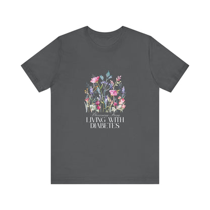 The Diabuddies Store Blossoming Strong, Living with Diabetes. - Unisex Tee Blossoming Strong, Living with Diabetes. - Unisex Tee: Wear your strength proudly! Our "Blossoming Strong, Living with Diabetes" Unisex Tee is a beautiful reminder of your inner po