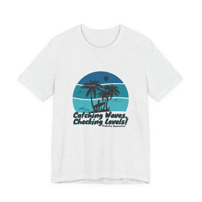The Diabuddies Store Catching Waves, Checking Levels - Unisex Tee Catching Waves, Checking Levels - Unisex Tee: Hit the beach or the studio in comfort with our "Catching Waves, Checking Levels..." tee, designed for everyone, including those managing diabe